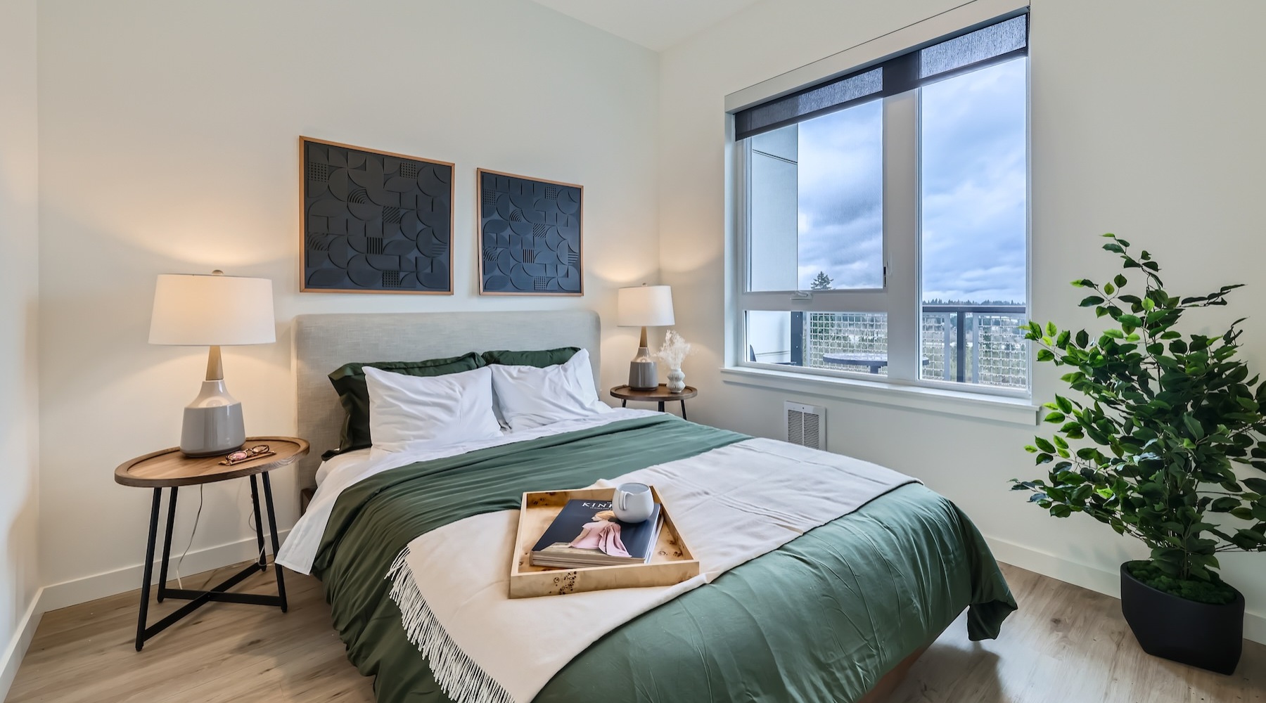 a bedroom with a bed and two nightstands