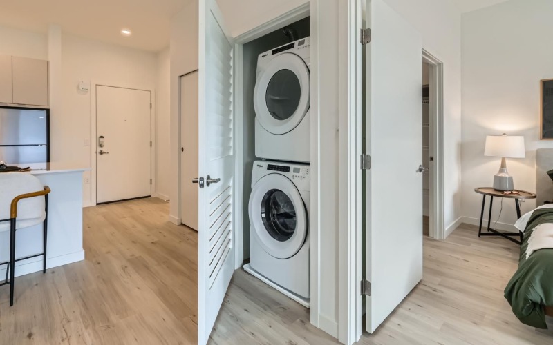a washing machine and a dryer in a closet
