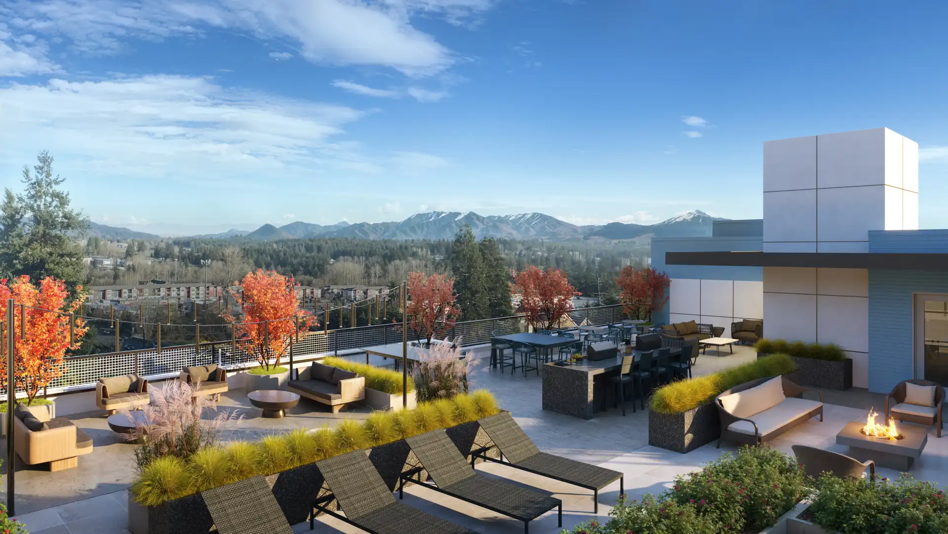 Knox rooftop patio with lounge seating, firepit, and a view of the Cascade mountains.